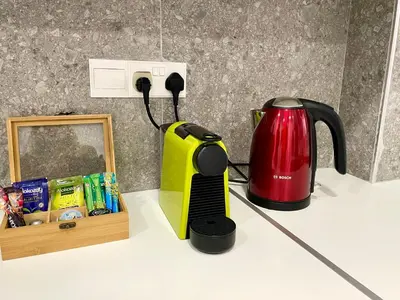 a coffee maker and a tea kettle on a counter at Stasinou 52 in Limassol