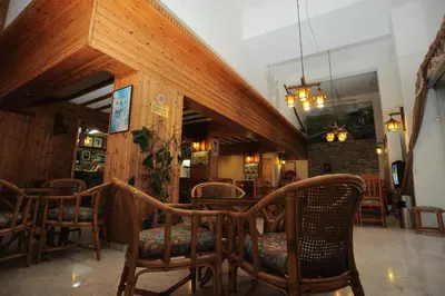 a dining room with a table and chairs at Elysso Apartments in Larnaka