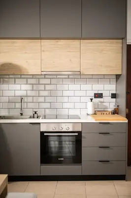 a kitchen with a stove and a sink at Sky-view Hideaway in Nicosia
