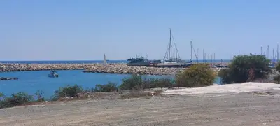 a body of water with boats in a harbor at Seaside Studio Zygi in Zygi