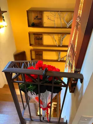 a table with a bunch of red roses on it at Sotira Agia Napa Luxury House in Ayia Napa