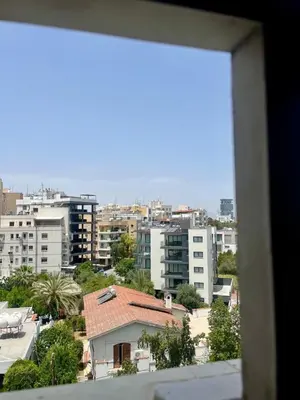a view from a window of a city with buildings at 1BDR Affortable and Cozy Stay in Nicosia - Ioanni Polemi By Platform 357 in Nicosia