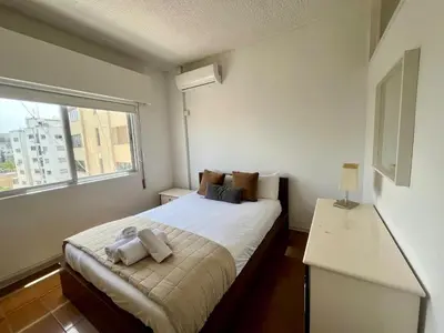 a bedroom with a bed with two towels on it at 1BDR Affortable and Cozy Stay in Nicosia - Ioanni Polemi By Platform 357 in Nicosia