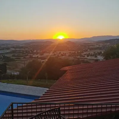a view of the sunset from a roof at Sunset Retreat Cyprus in Pendakomo