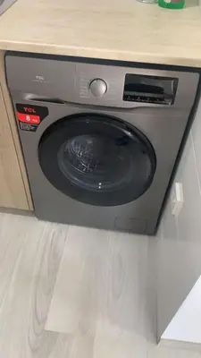 a microwave oven in a counter in a kitchen at Prestige Worldwide Apartments in Ayia Napa