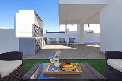 a tray of fruit on a table on a patio at Villa Amazonia - Large Private Pool in Protaras