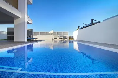 a swimming pool in front of a building at Villa Amazonia - Large Private Pool in Protaras