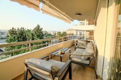 a balcony with chairs and a view of the city at Perfect for families, Beach 3 Min away, Brand New in Limassol