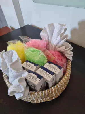 a basket of food sitting on a table at Tereza's House in Ayvaryara