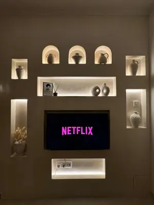 a television on a wall with a netflix sign on it at Relaxing Gateway in Limassol in Episkopi Lemesou