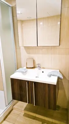 a bathroom with a sink and a mirror at Cyprus Dreams Village in Protaras