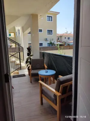 a view of a balcony with a table and chairs at Vicky apartment in Paralimni