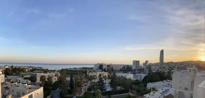 an aerial view of a city at sunset at Green Door Getaway in Limassol