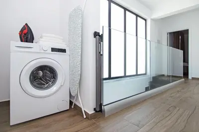 a washing machine in a room with a window at Villa Celestia in Protaras