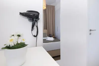 a hospital room with a phone hanging on the wall at Villa Genesis in Protaras