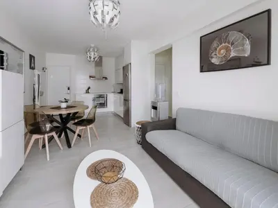 a living room with a couch and a table at Viking Family Superior Lux in Ayia Napa