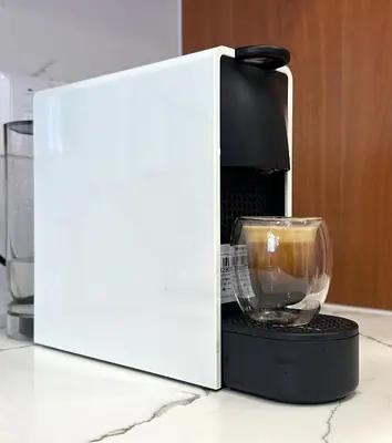 a coffee maker with a glass bowl on a counter at Finikoudes 3 Bedroom Seaview Flat in Larnaka