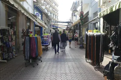 a group of people walking down a street at Chariandry Residence, Limassol City Centre in Limassol