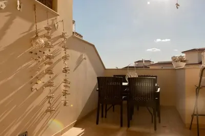 a dining room with a table and chairs at Welcome to Thea Court in Paralimni