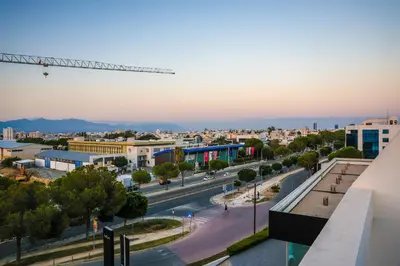 a view of a city street with a crane at Luxury Stay in Engomi