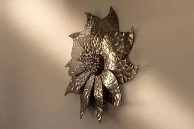 a metal flower decoration on a wall at SEVIS SUITES in Ayia Napa