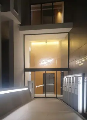 an entrance to a building with a glass door at Deluxe 1 Bed Apt Ayios Dometios in Ayios Dhometios
