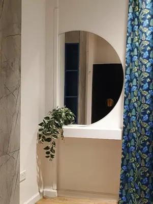 a plant sitting on a shelf next to a window at Unique City Centre Apartments in Nicosia