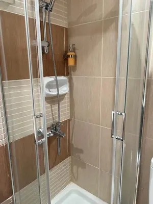 a bathroom with a shower and a sink at Ellados 20 in Limassol