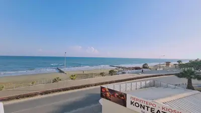 a view of the beach from a building at STAY Beach Wave Apartment in Larnaka