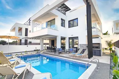 an image of a house with a swimming pool at Villa Daniella in Protaras