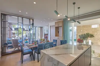 a kitchen and dining room with a table and chairs at Protaras Vie Bleu Villa Vb8 in Protaras