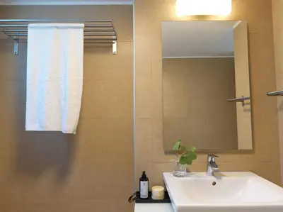 a bathroom with a sink and a mirror at Villa Orchard by Tangerine in Protaras