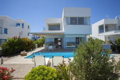 a view of a house with a swimming pool at Protaras Seafront Villa Melissa in Protaras