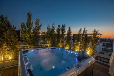 a hot tub on the balcony of a building at Olivine Pearl OL3 in Protaras