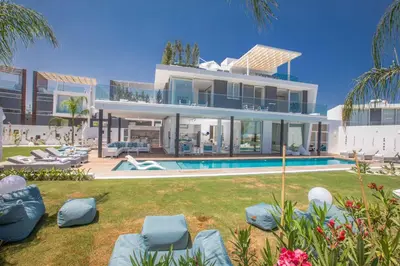 a large white house with a swimming pool at Olivine Pearl OL3 in Protaras