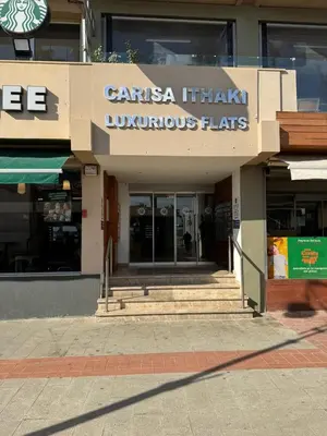 a store front of a building with a sign on it at 11 Suites - Sunrise Horizon Suite in Larnaka