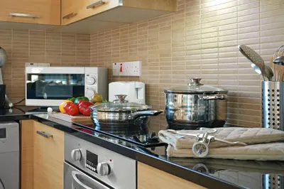 a kitchen with a stove and a counter top at Villa Anthia - 2bed with Large Pool in Ayia Napa