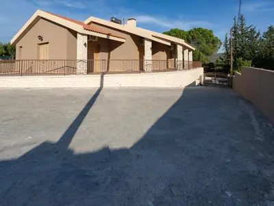 a shadow of a house in front of a driveway at Eidyllio ''The Mansion'' in Omodos