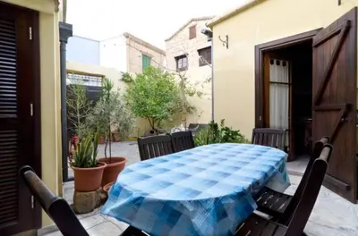 a patio with a table and chairs on a patio at Studio in the Old City of Nicosia in Nicosia