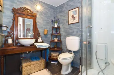 a bathroom with a toilet and a sink and a shower at Studio in the Old City of Nicosia in Nicosia