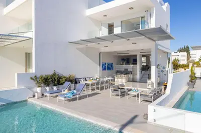 an image of a house with a swimming pool at Protaras Elaia Luxury Seafront Villa in Protaras