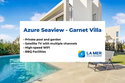 a sign for a villa with a swimming pool at Azure Seaview - Garnet Villa in Protaras