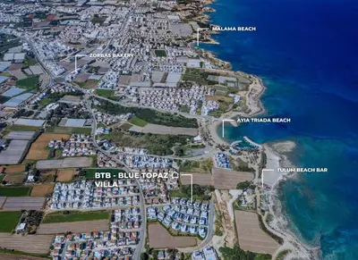 a map of a resort near the ocean at By The Beach - Blue Topaz Villa in Protaras