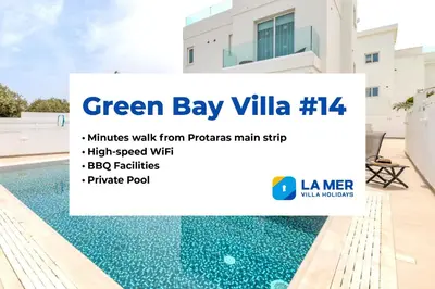a sign that reads green bay villa minutes walk from projects mainstay at Green Bay Villa #14 in Protaras