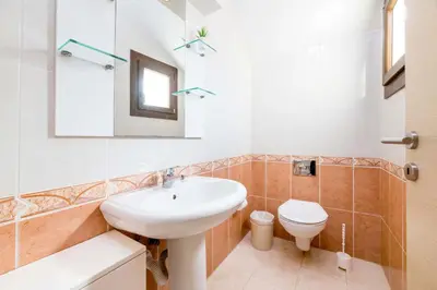 a bathroom with a sink and a toilet at Villa Greco Mare #20 in Protaras