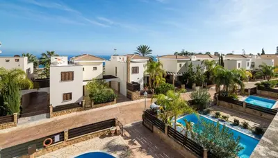 an aerial view of a villa with two swimming pools at Villa Greco Mare #20 in Protaras