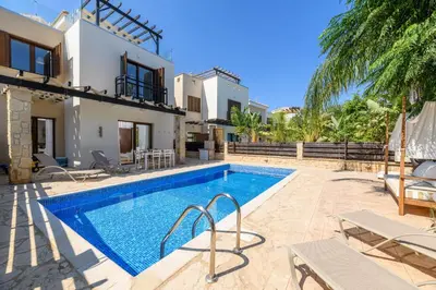 an image of a villa with a swimming pool at Villa Greco Mare #40 in Protaras