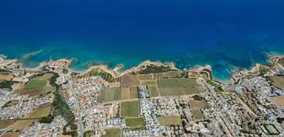 an aerial view of a city next to the ocean at Villa Hannah in Protaras