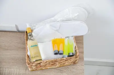 a basket filled with cleaning products and a bottle at Quattro City Center Ap 501B in Larnaka