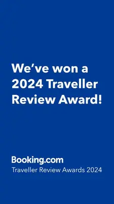 a blue sign that says weve won a traveler review award at Gaia Seaview Apartment 2 in Larnaka